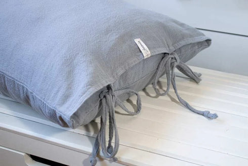 Long cushions with removable covers made of robust cotton house canvas